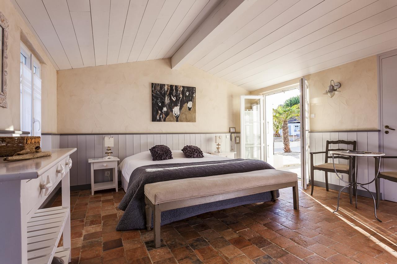 Hotel Les Bois Flottais เลอบัวส์-ปลาจ-อ็อง-เร ภายนอก รูปภาพ