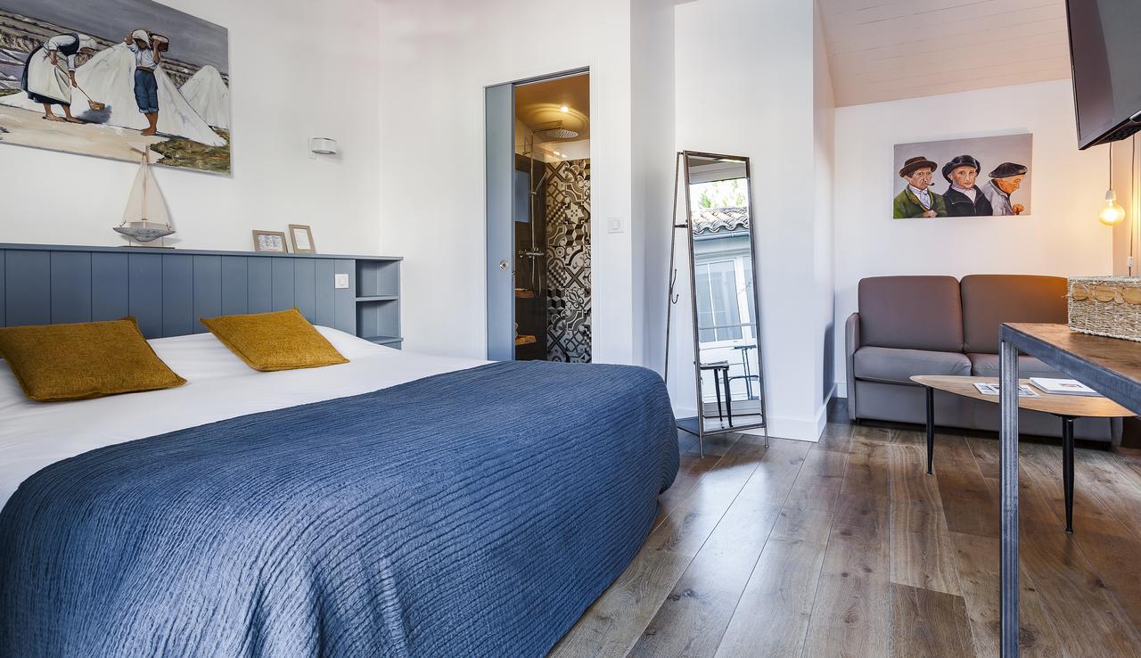 Hotel Les Bois Flottais เลอบัวส์-ปลาจ-อ็อง-เร ภายนอก รูปภาพ